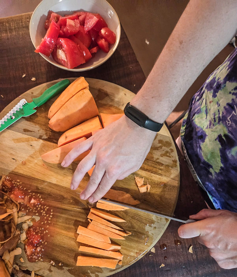 cutting up different vegetables for the recipe