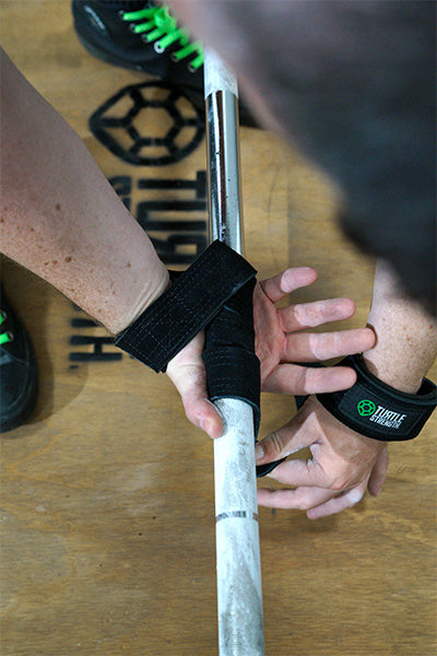 lifting straps about to wrapping around bar