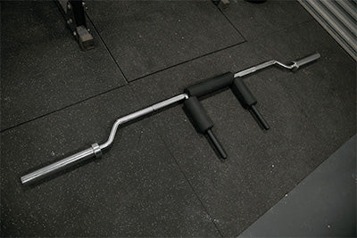 safety squat barbell on rubber background