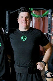 Turtle Strength Founder wearing Turtle Strength TShirt and Weight Lifting Belt