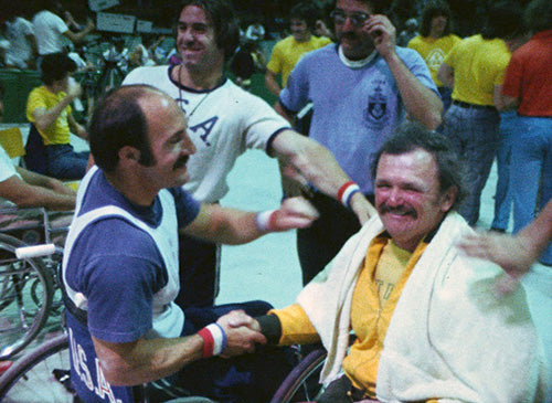 Vic Renalson shaking hands at the Australian Paralympics