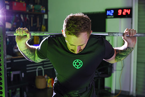 man getting ready for a big lift wearing his lifting belt